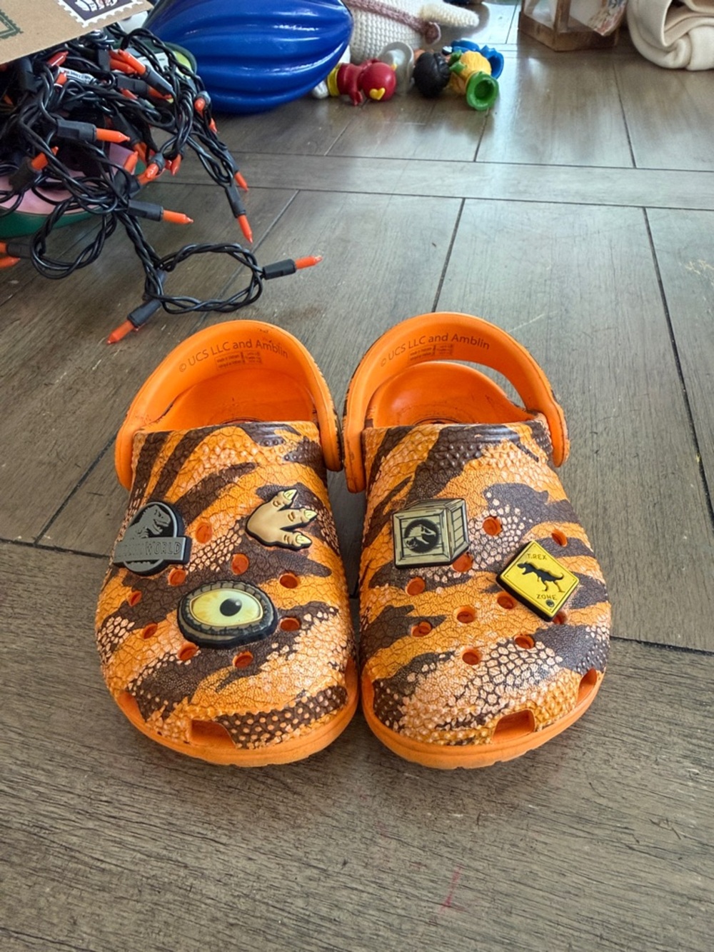 CROCS Kids Orange & Brown Dinosaur Print Clog Sandals